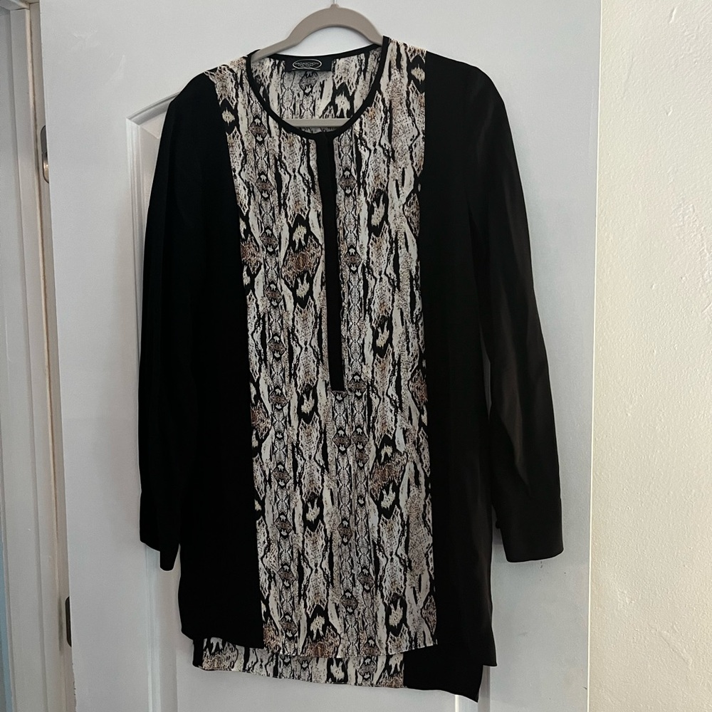 Magaschoni silky black top with animal print insert.